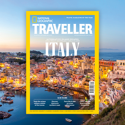 National Geographic Traveller (UK) magazine cover displayed in print format, forming a snapshot of a wider image.